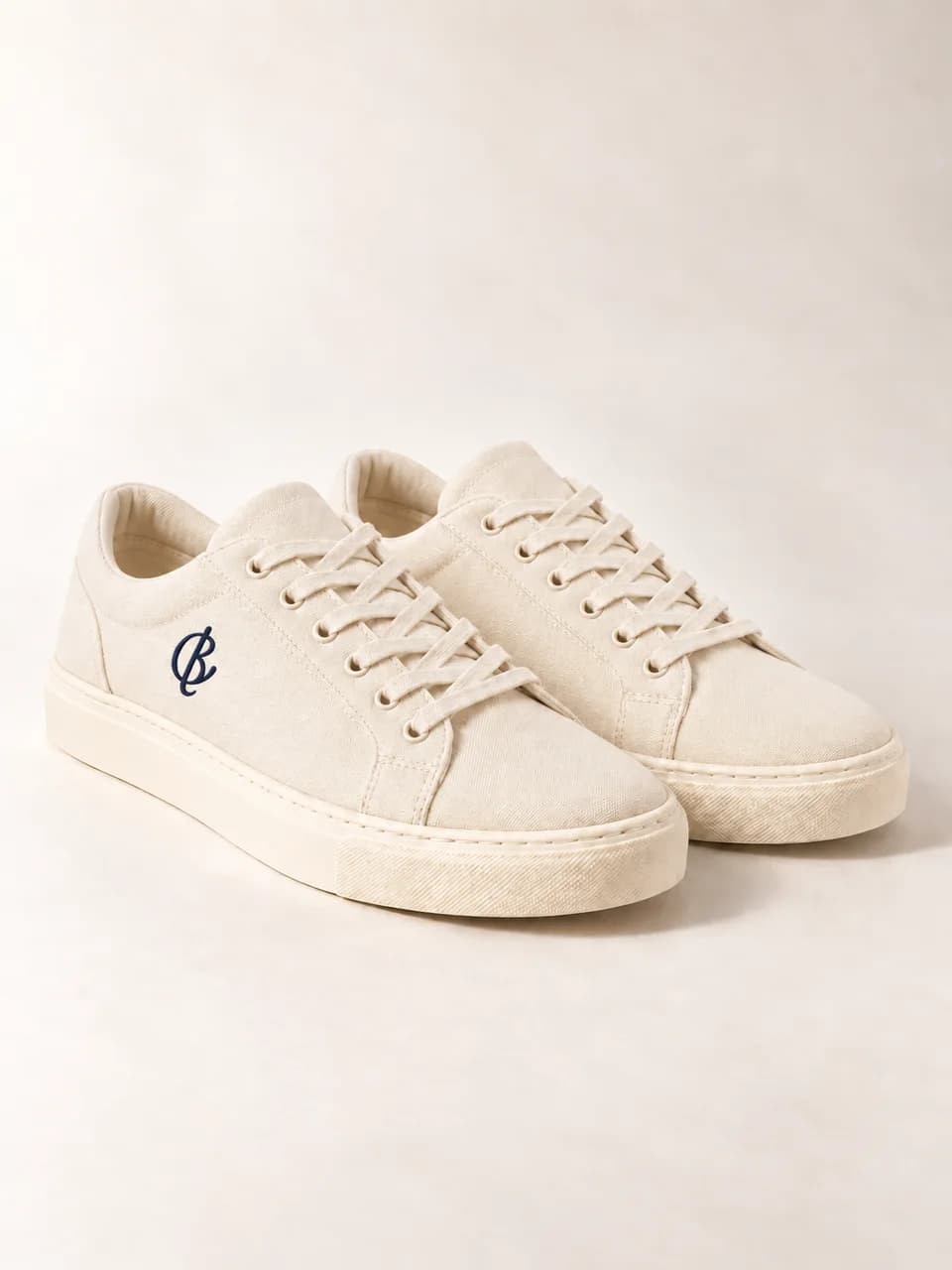 AI-generated Continuum Trainers Cream concept — proposed footwear branding. Unproduced; final specifications subject to change.
